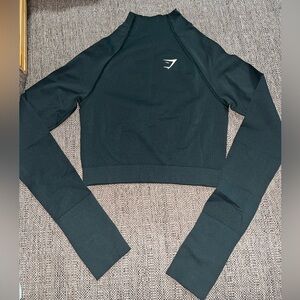 Gymshark Vital
Seamless 2.0 High
Neck Midi Top 
Woodland Green
Marl Size medium